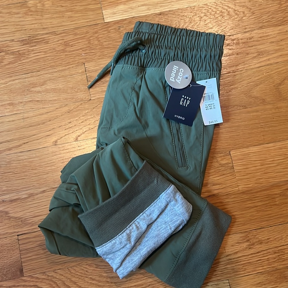 New with tags. Baby gap boys 5t. Sage green pants - cozy, stretchy, and lined.